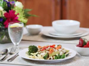 A plate of food in the restaurant at Auburn Oaks