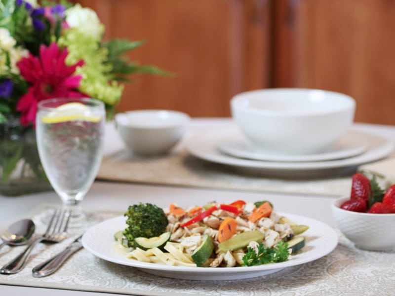 A plate of food in the restaurant at Auburn Oaks