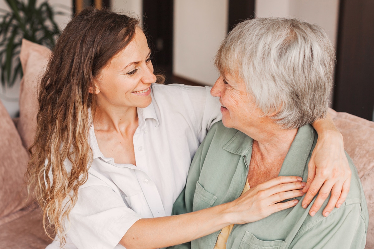 woman hugging an older woman